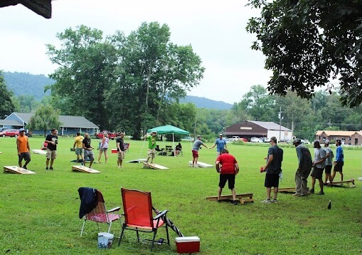 cornhole tournament held in a park