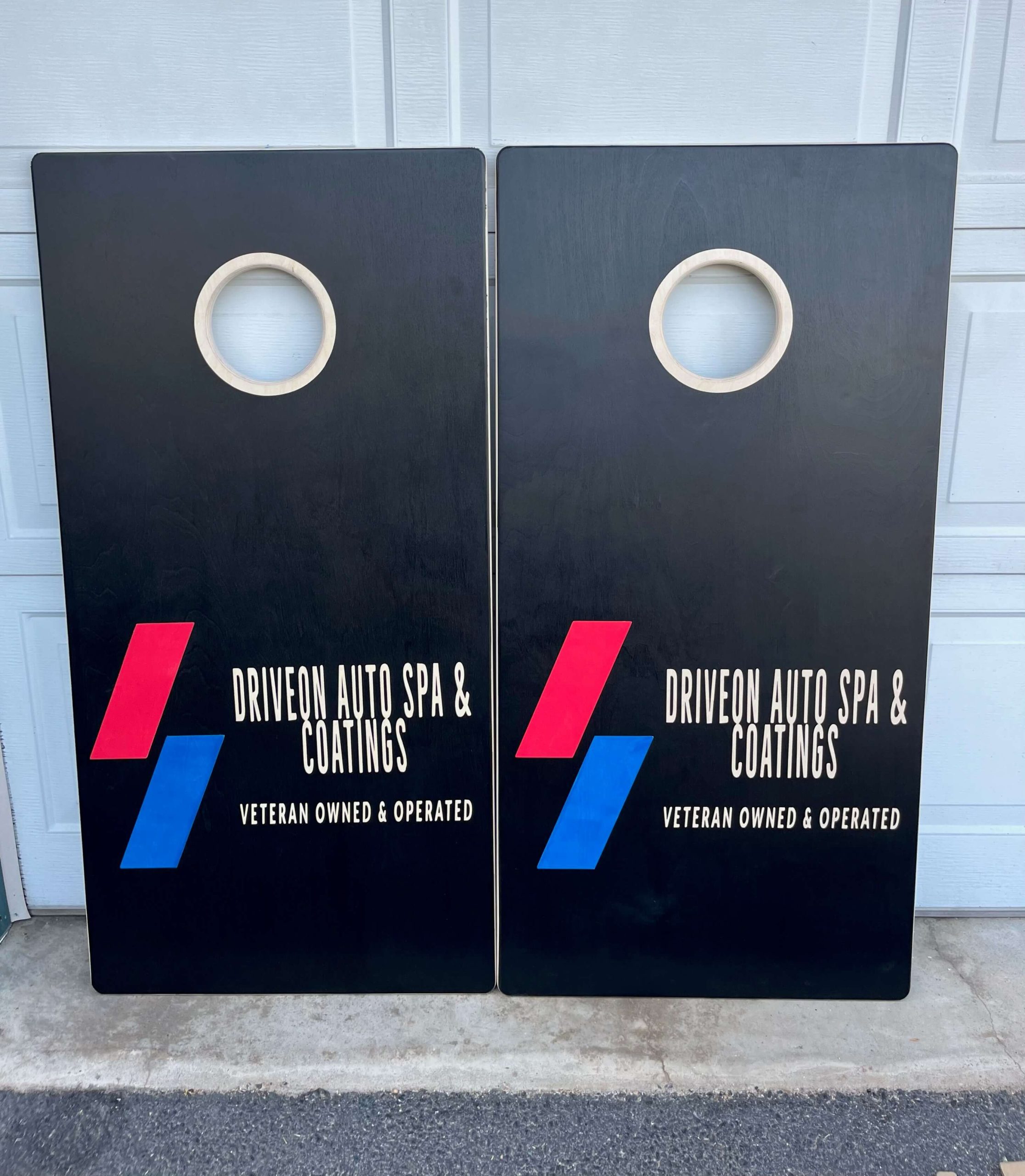driveon auto spa and coatings sponsored cornhole boards